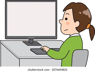 A woman working at a company using a desktop computer