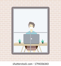 A woman working at the computer seen from the window
