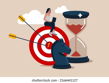 Woman working with computer sit on target with chess knight and sandglass. Business strategy, planning to achieve goal, management for company growth opportunity, market success goal.