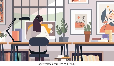 Woman working at desk home office modern workspace with plants books and art on walls