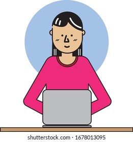 A woman is working with her computer