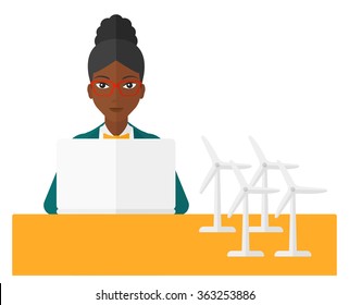 Woman working at laptop. 