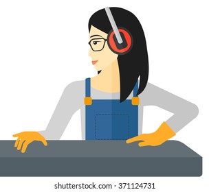 Woman working on steel-rolling mill.
