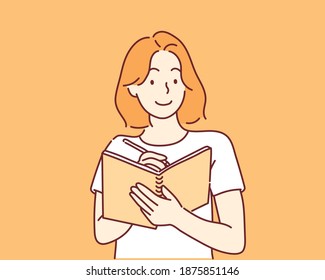 A woman writes a list of goals for 2021 in a white notebook. Hand drawn style vector design illustrations.