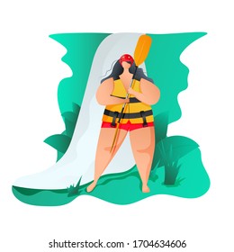 A woman in a yellow life preserver with a kayak oar against the backdrop of a waterfall.