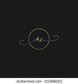 Womanish type luxurious and minimalist MI black and golden color initial based letter icon logo