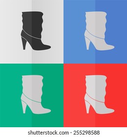 Woman's boots vector icon. Effect of folded paper. Colored (red, blue, green) illustrations. Flat design