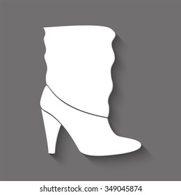 woman's boots vector icon with shadow