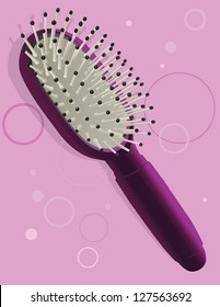 Woman's hair brush on pink background