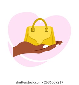 woman's hand carrying a luxury branded bag