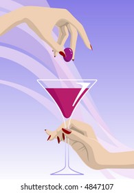 Woman's hand drops a grape into the glass with wine