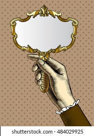 Woman's hand with a gold retro mirror. Vintage stylized drawing. Vector Illustration