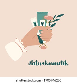 Woman's hand holding beauty products variety. "Naturkosmetik" hand drawn lettering in German, in English means "Organic cosmetics". Beauty and health care concept. Vector hand drawn illustration