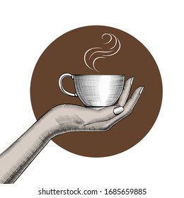Woman's hand holding Coffee