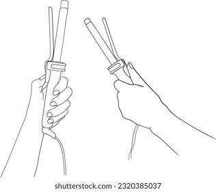 Woman's hand holding curling