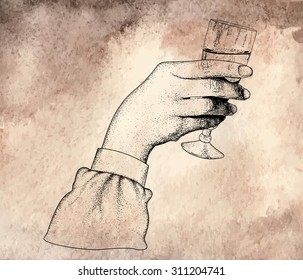 Woman's hand holding a glass of alcoholic drink.Engraving style.Vector illustration