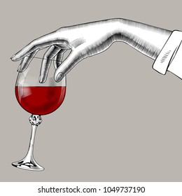 Woman's Hand Holding A Glass With Red Wine. Vintage Engraving Stylized Drawing. Vector Illustration