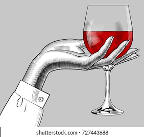 Mano de mujer sosteniendo un vaso con vino tinto. Dibujo estilizado con grabado de época. Ilustración del vector