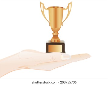 Woman's hand holding object- bronze cup