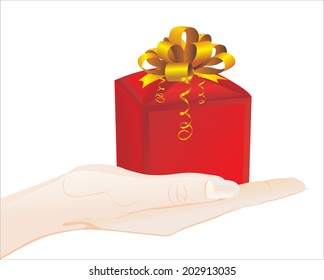 Woman's hand holding object - gift