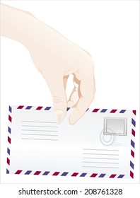 Woman's hand holding object- postage envelopes