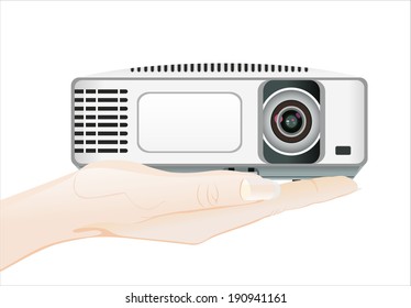 Woman's hand holding object- Video projector isolated on white background.