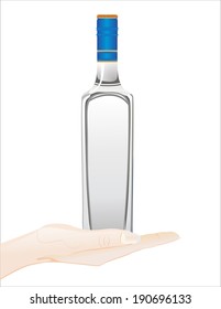 Woman's hand holding object-Bottle of vodka isolated on white background.