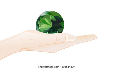 Woman's hand holding object-emerald isolated on white background. 
