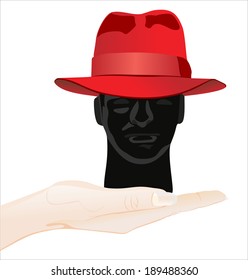 Woman's hand holding object-hat