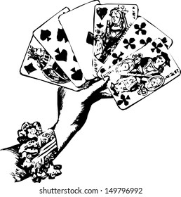 woman's hand holding playing cards