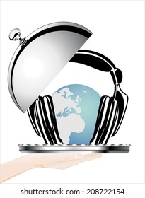 Woman's hand holding silver platter with Earth globe with headphones, world music concept.