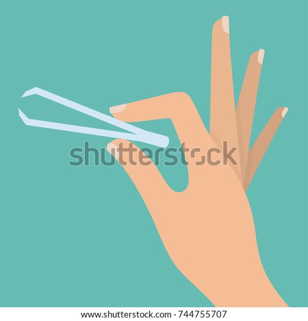 Woman's hand holding tweezers ストックフォト © 