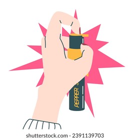 Woman's hand holding and using pepper spray