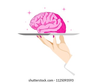 A woman's hand holds a human brain on a tray.