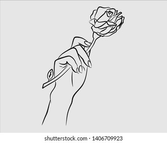 female hand holding flower