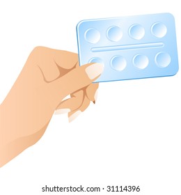 woman's hand with pills.