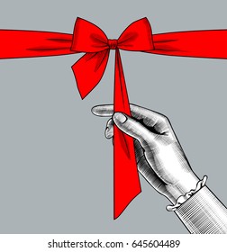 Woman's hand untying bow of red ribbon. Vintage engraving stylized drawing. Vector illustration