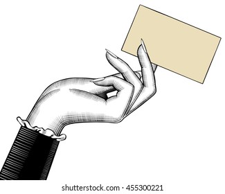 Woman's hand with a visiting card. Vintage engraving stylized drawing. Vector illustration