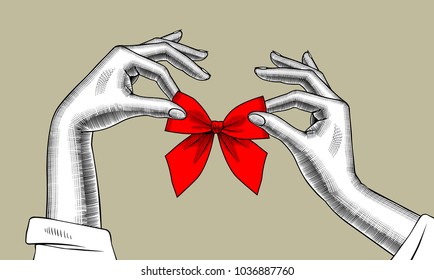 Woman's hands with bow of red ribbon. Vintage engraving stylized drawing. Vector illustration