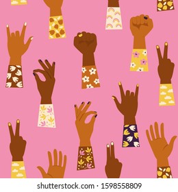 Woman's hands with her fist raised up and with various hands gestures. Girl Power. Feminism concept. Seamless pattern.