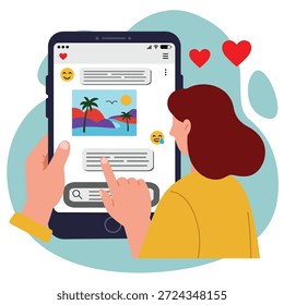 Las manos de una mujer sostienen un teléfono inteligente oscuro, con el dedo tocando la pantalla de una aplicación de chat que muestra una Imagen tropical, mensajes y emojis, con corazones rojos flotando