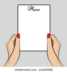 Womans hands holding a menu