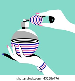 Woman's hands holding a vintage perfume bottle with atomizer.