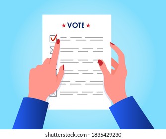 Woman's hands holding a voting paper. Vote 2020 in USA