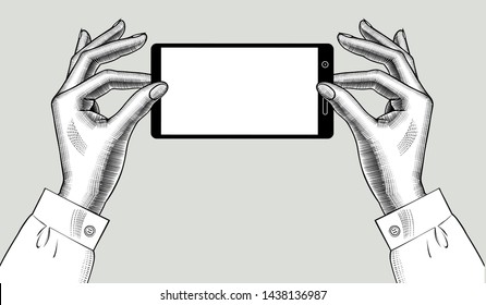 Woman's hands holds a modern smartphone with a blank chromakey screen. Call pop-art concept. Vintage engraving stylized drawing. Vector illustration