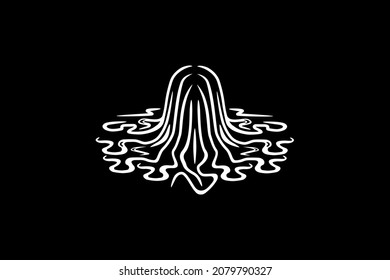The woman's head emerged from the water. Hair spreads around the surface of the water. Bathing in the river, viewed from behind.