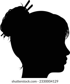 A womans head with face in silhouette profile.