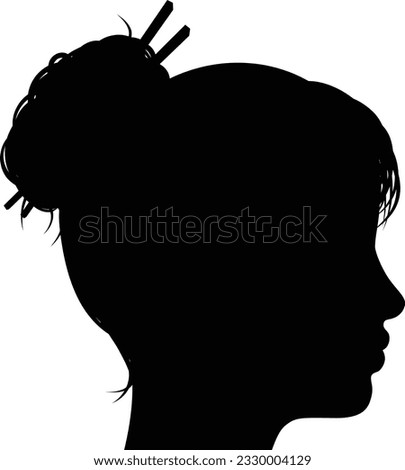 A womans head with face in silhouette profile.