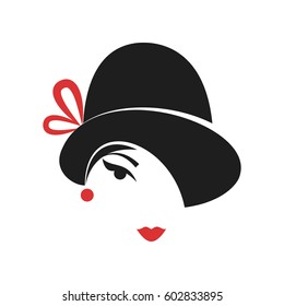 woman's head in a hat in the style of the 20's. Silhouette.Vector