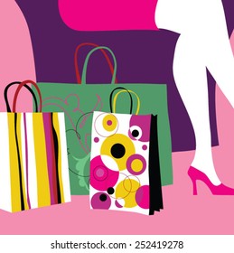 Woman's legs and shopping bags